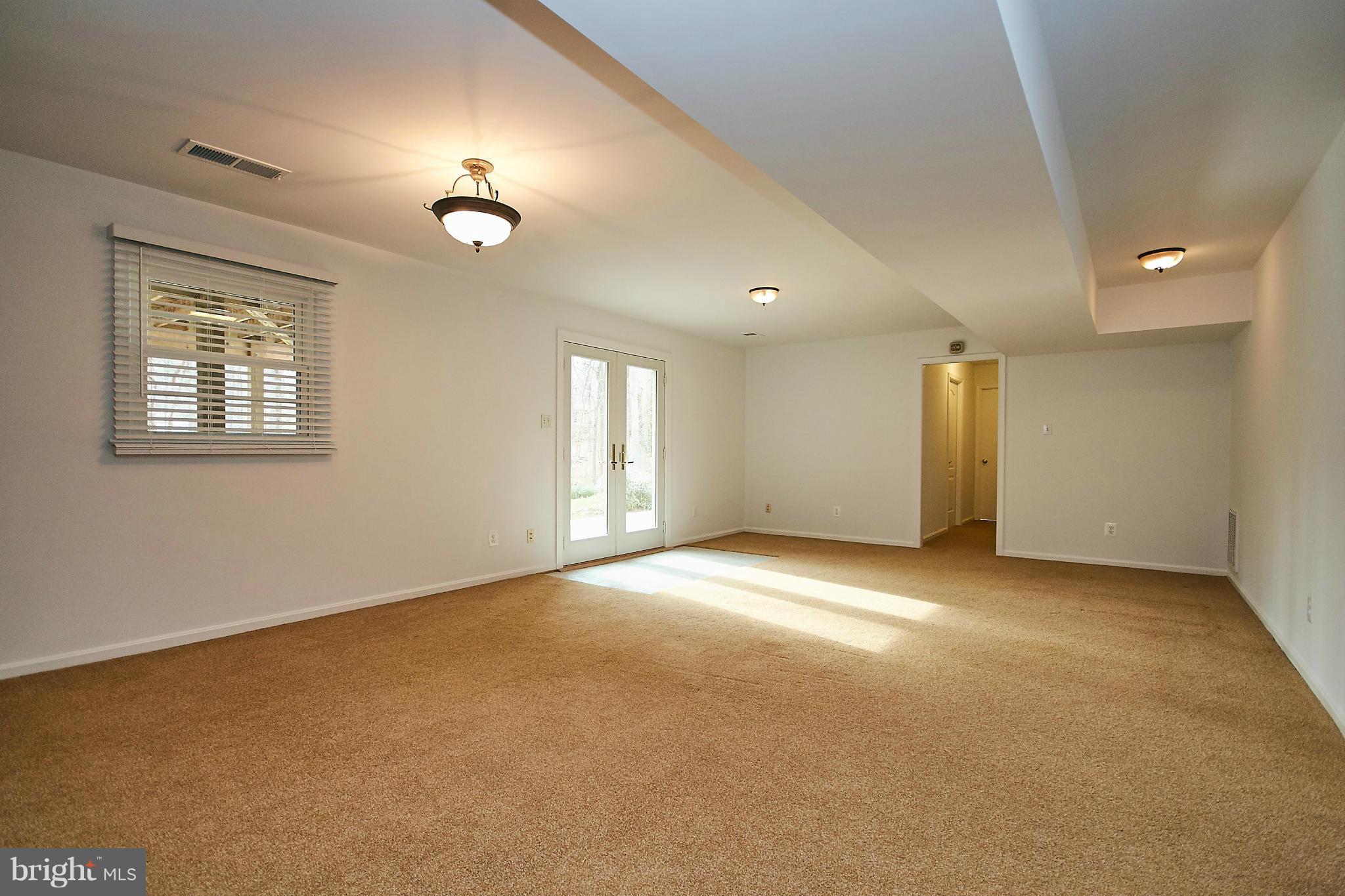 2402 Old Trace Lane Reston, VA 20191 - Photo 20 of 30 Lower Level Family Room