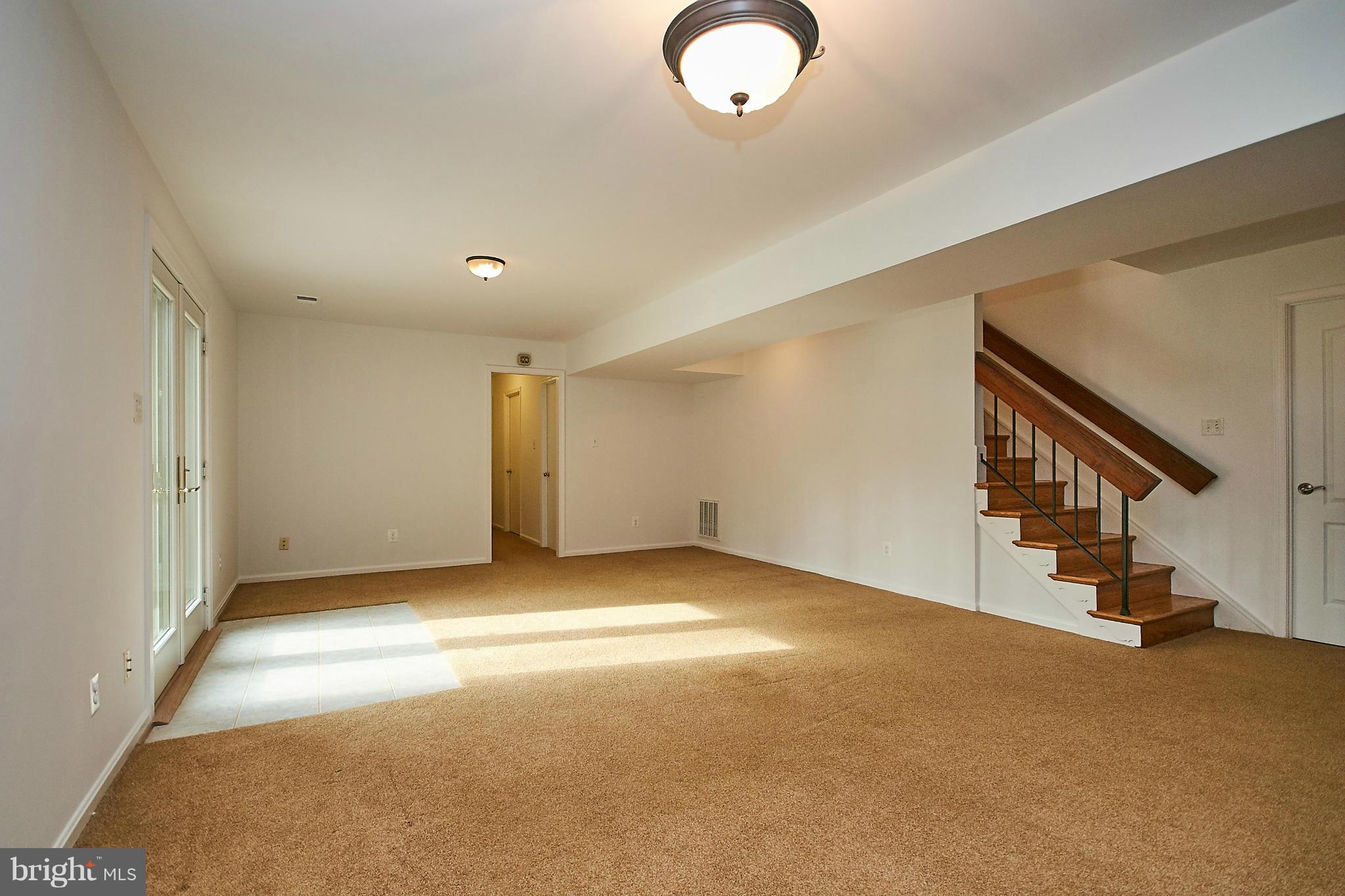 2402 Old Trace Lane Reston, VA 20191 - Photo 22 of 30 Lower Level Family Room