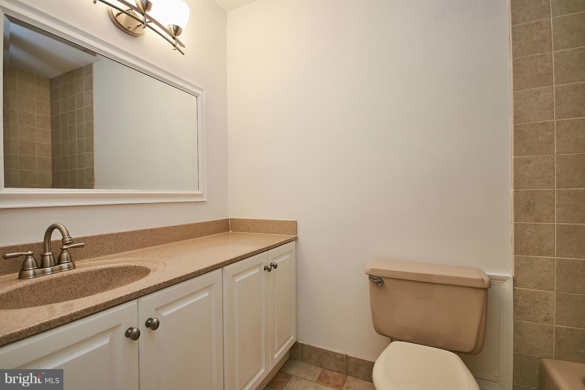 2402 Old Trace Lane Reston, VA 20191 - Photo 10 of 30 Main Level Hall Bath