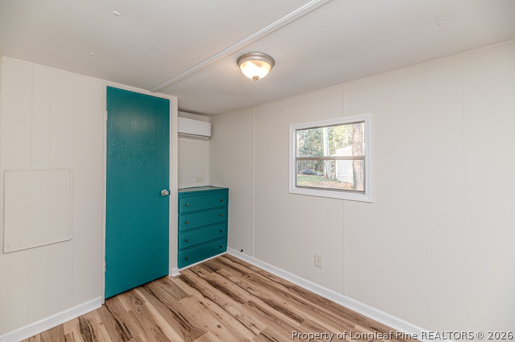 161 White Oak Street Carthage, NC 28327 - Photo 18 of 29 a view of a room that has a bed and a window