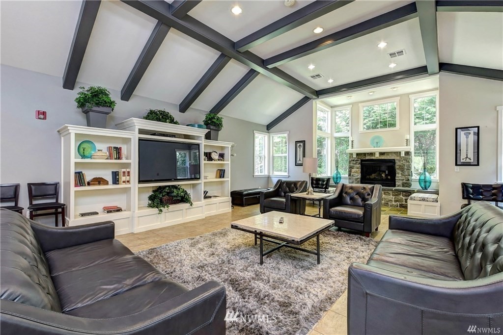 4818 Davis Place South Renton, WA 98055 - Photo 14 of 14 a living room with furniture and a fireplace