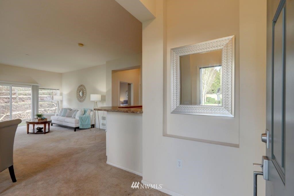 4818 Davis Place South Renton, WA 98055 - Photo 3 of 14 a living room with furniture and a large window