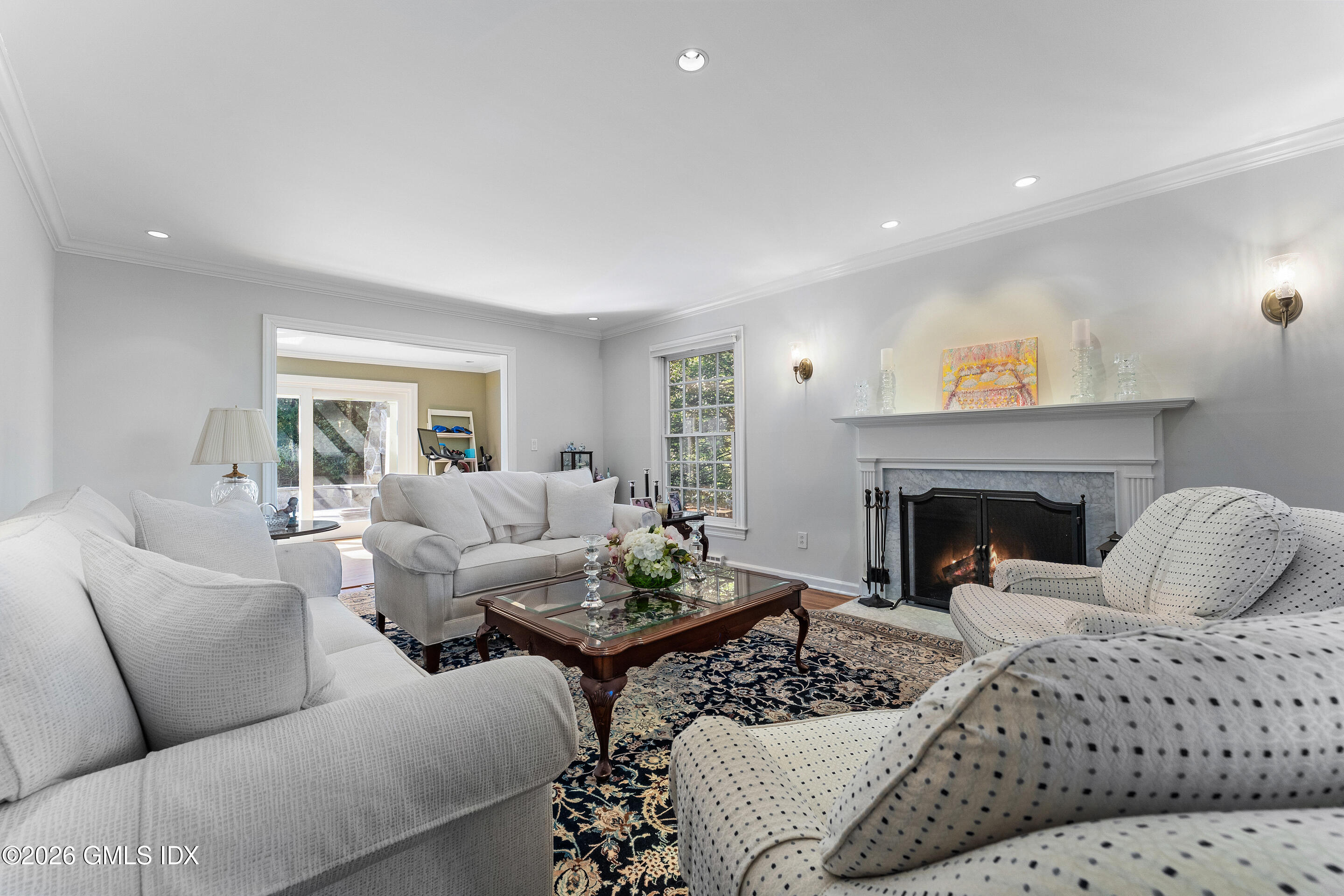 78 Meadow Road Riverside, CT 06878 - Photo 3 of 17 a living room with furniture and a fireplace