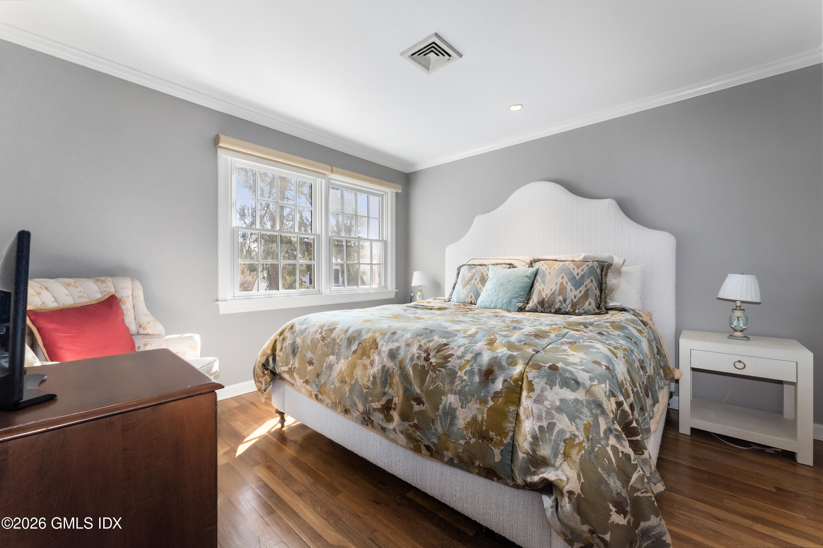 78 Meadow Road Riverside, CT 06878 - Photo 10 of 17 a bedroom with a bed and window