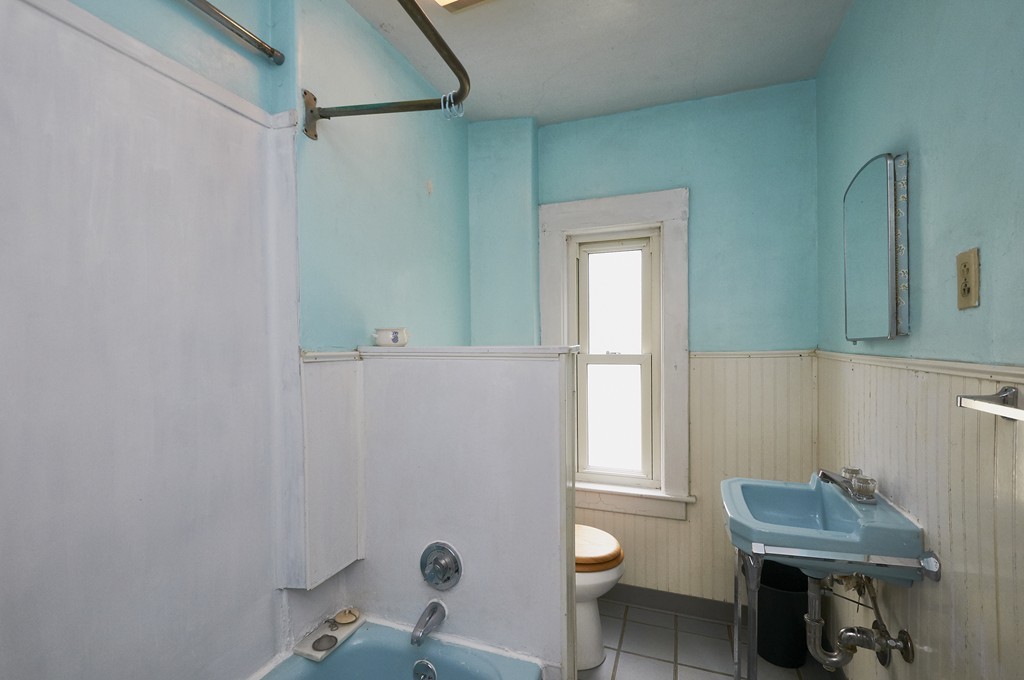 1146 Chestnut Street Newton, MA 02464 - Photo 16 of 19 a bathroom with a sink window and toilet