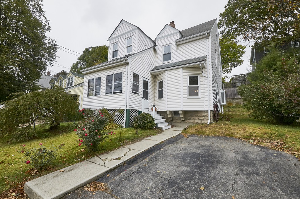 1146 Chestnut Street Newton, MA 02464 - Photo 2 of 19 a view of a house with a yard