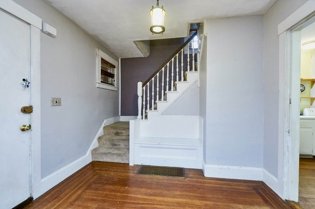 1146 Chestnut Street Newton, MA 02464 - Photo 4 of 19 a view of entryway and hall with wooden floor