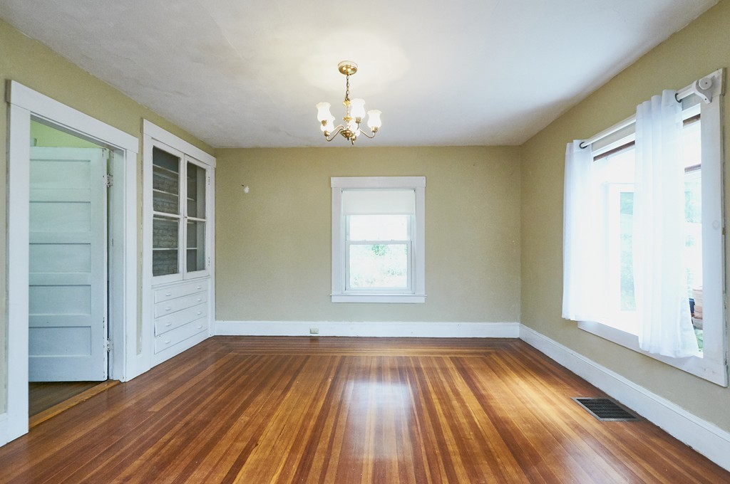 1146 Chestnut Street Newton, MA 02464 - Photo 8 of 19 wooden floor in an empty room with a window