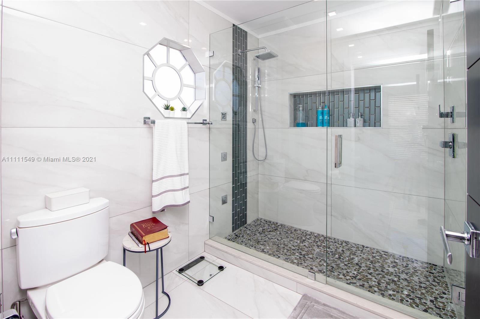 12099 Rockwell Way Boca Raton, FL 33428 - Photo 26 of 60 a bathroom with a toilet a sink and a shower