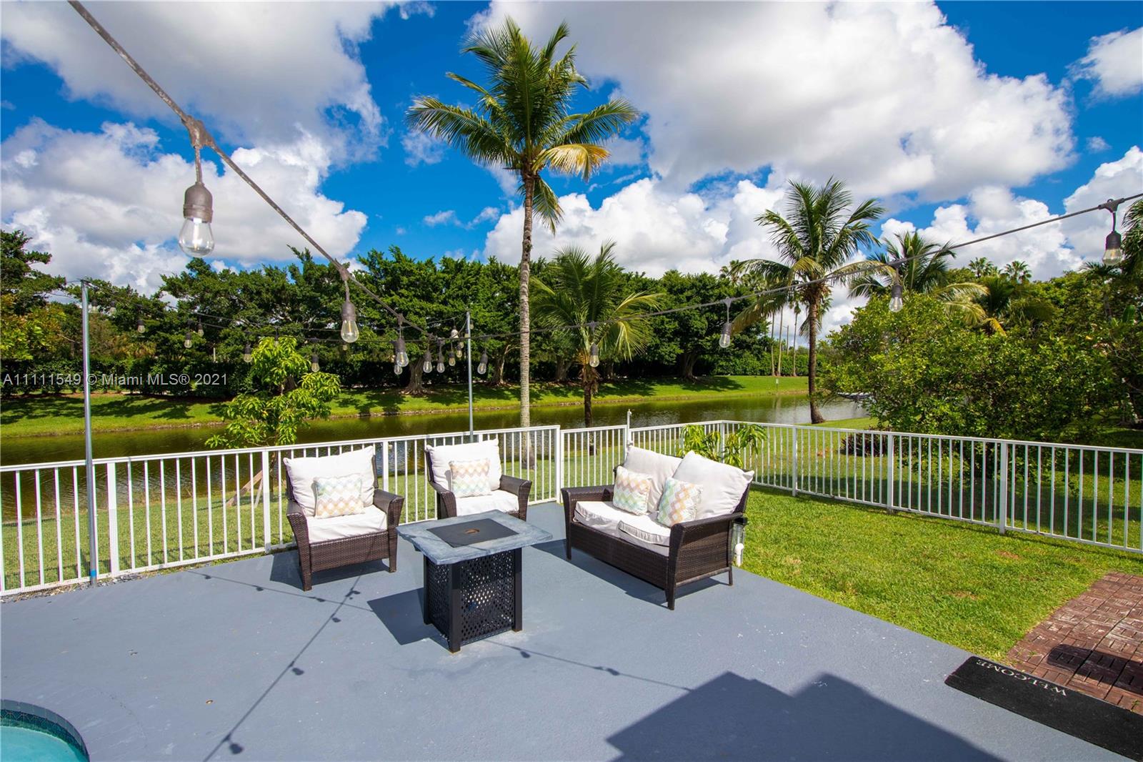 12099 Rockwell Way Boca Raton, FL 33428 - Photo 39 of 60 a balcony with furniture and garden