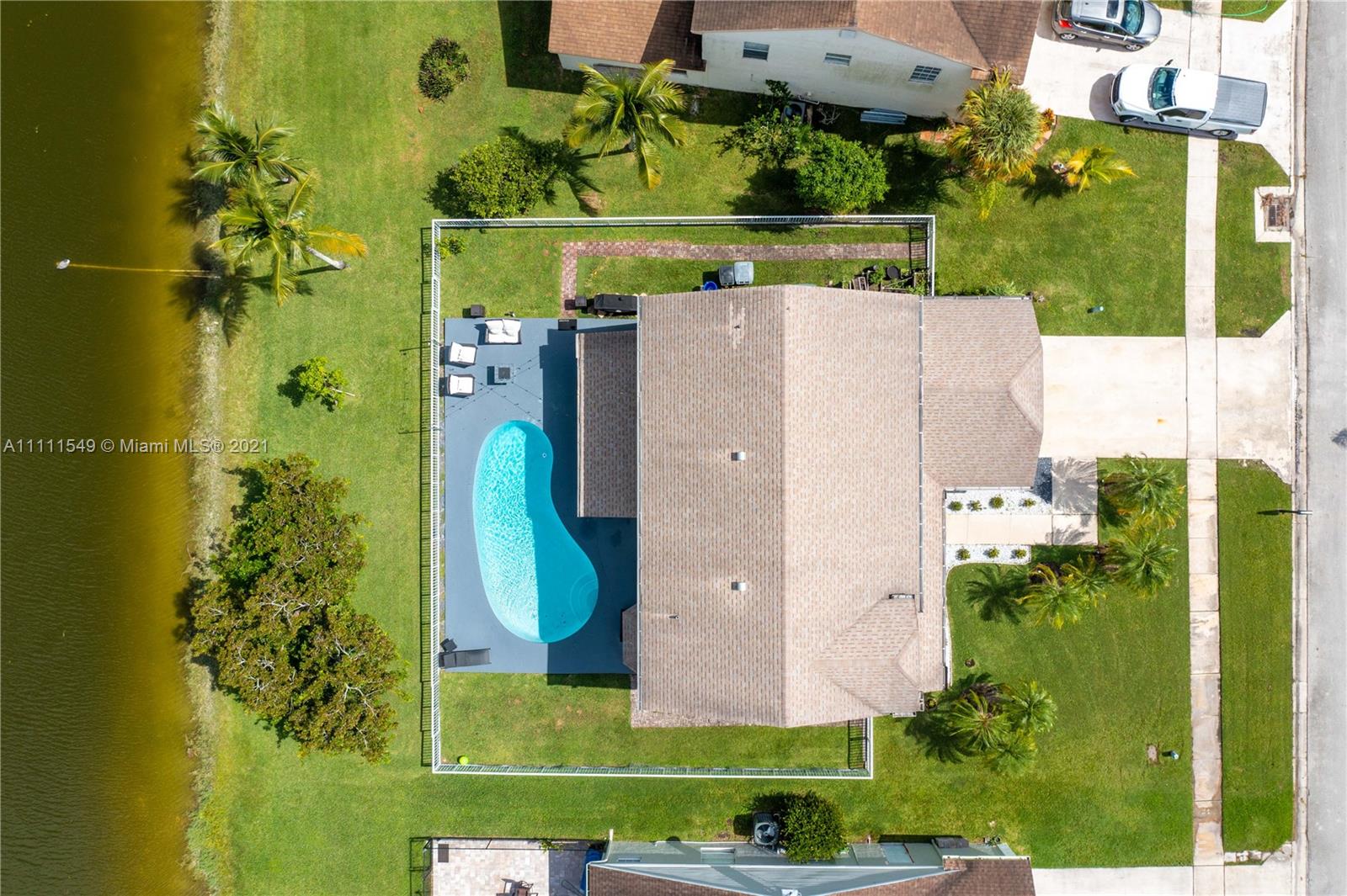 12099 Rockwell Way Boca Raton, FL 33428 - Photo 50 of 60 an aerial view of a house with a garden