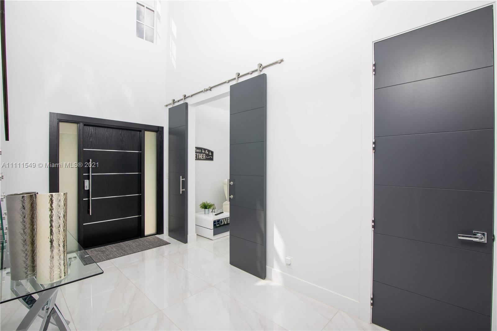 12099 Rockwell Way Boca Raton, FL 33428 - Photo 6 of 60 a room with closet and a window