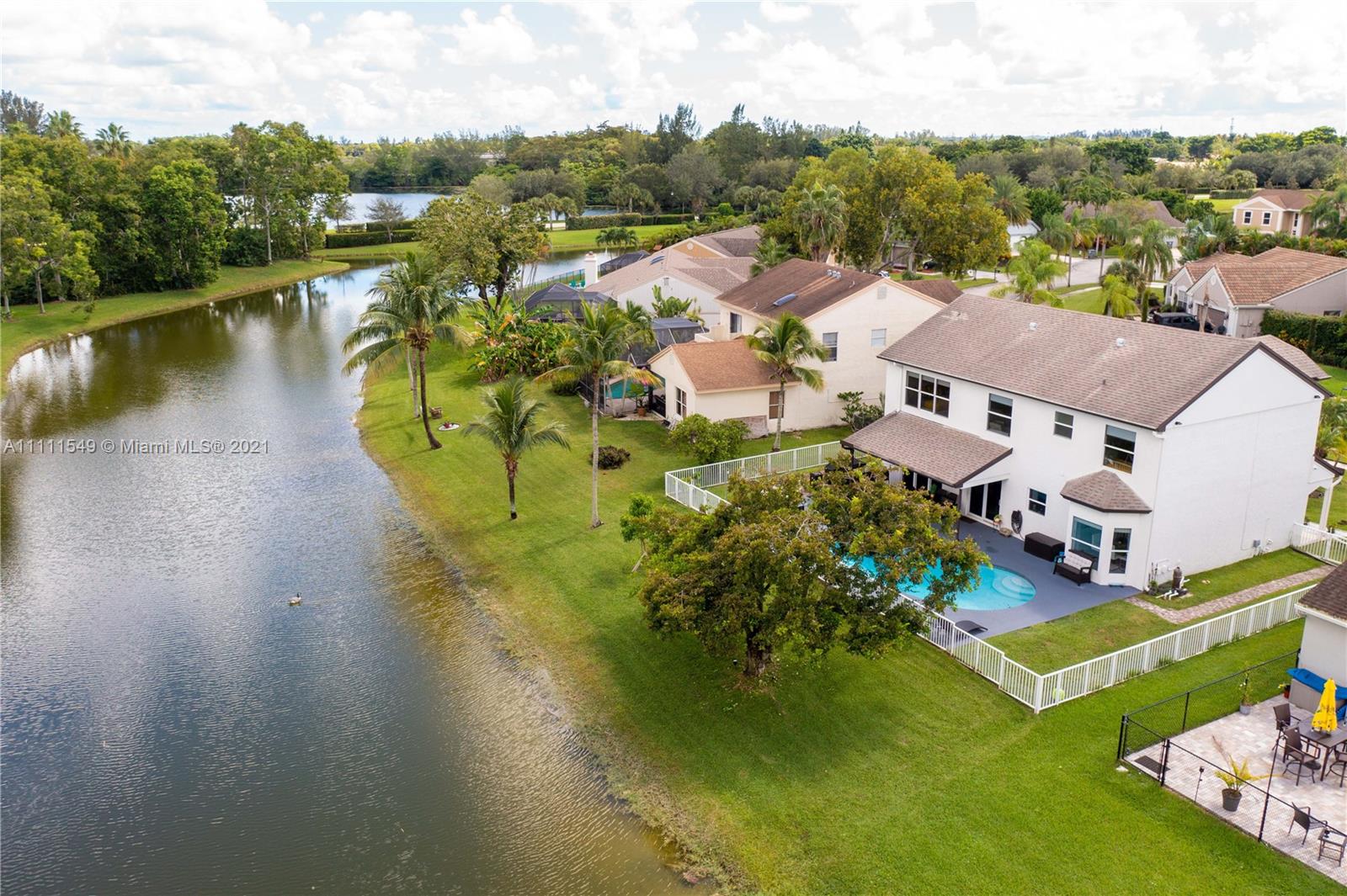 12099 Rockwell Way Boca Raton, FL 33428 - Photo 54 of 60 an aerial view of residential house with outdoor space and lake view