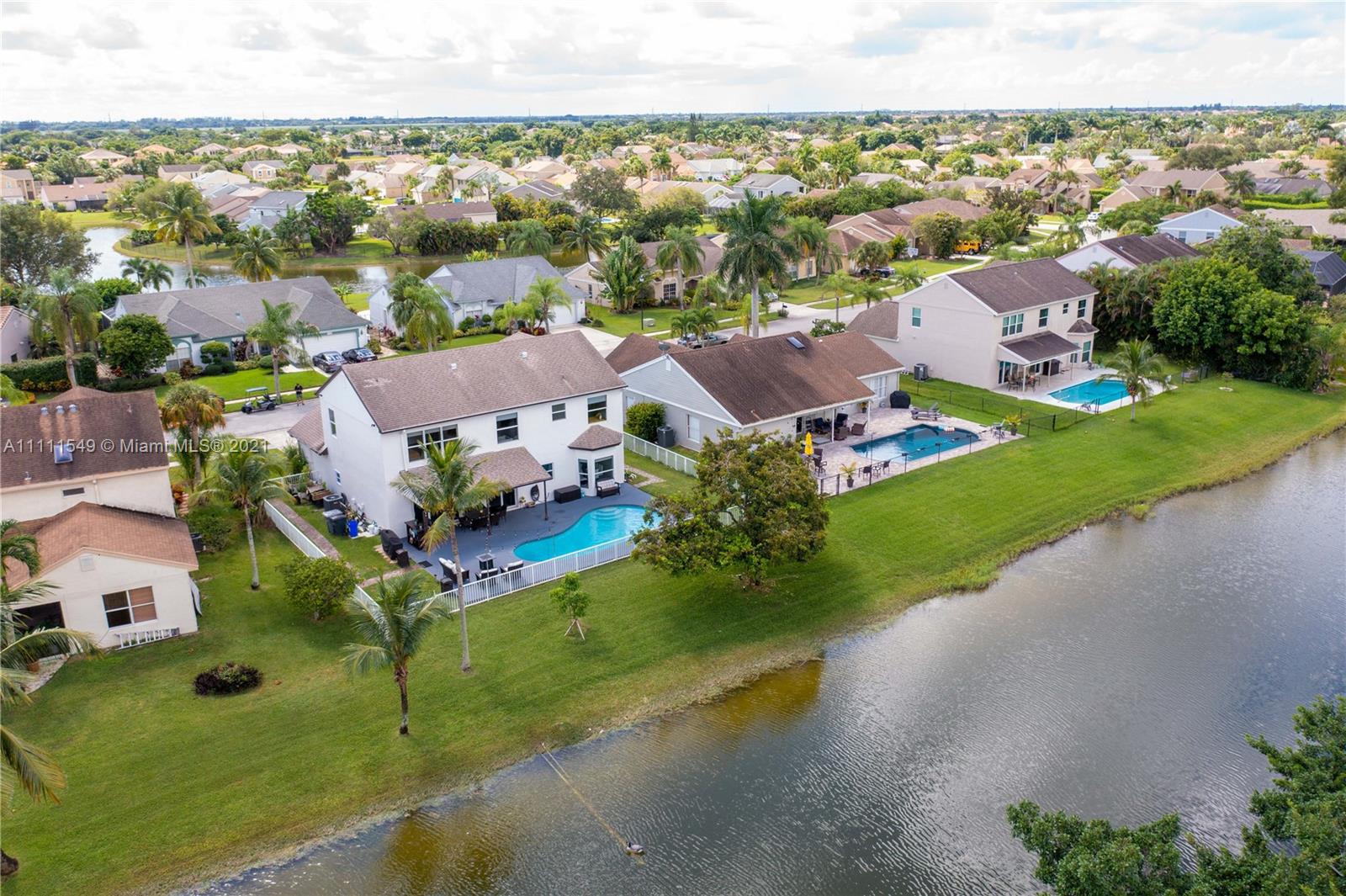 12099 Rockwell Way Boca Raton, FL 33428 - Photo 55 of 60 an aerial view of a house with a garden
