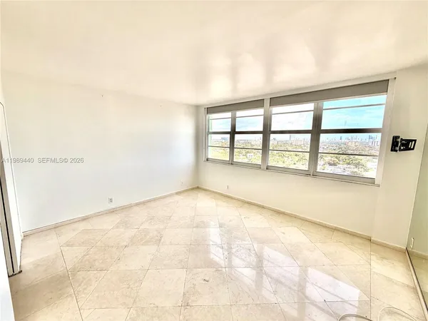 an empty room with windows
