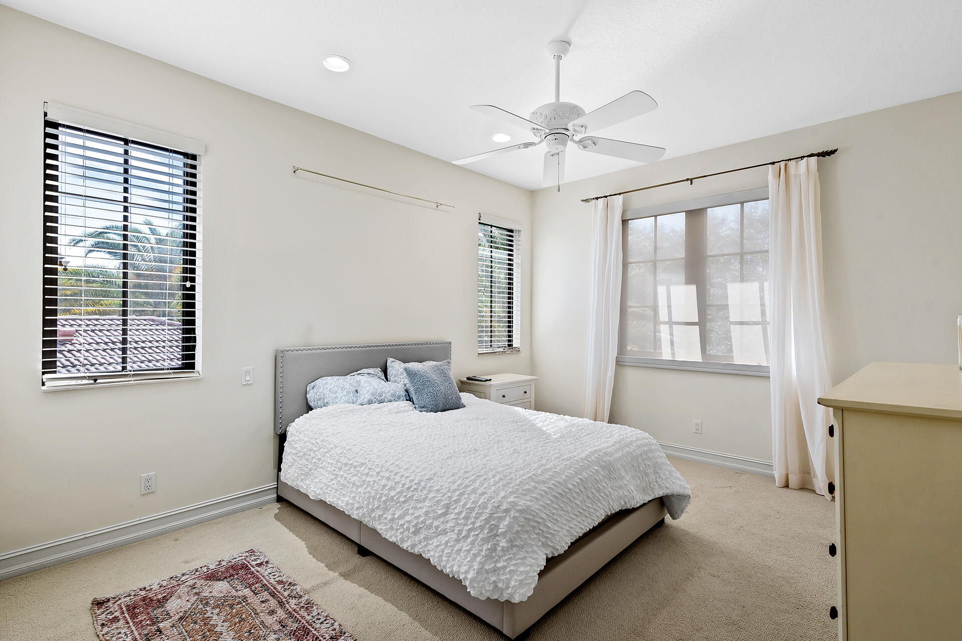 9455 Bridgebrook Drive Boca Raton, FL 33496 - Photo 35 of 63 a bedroom with a large bed and a window