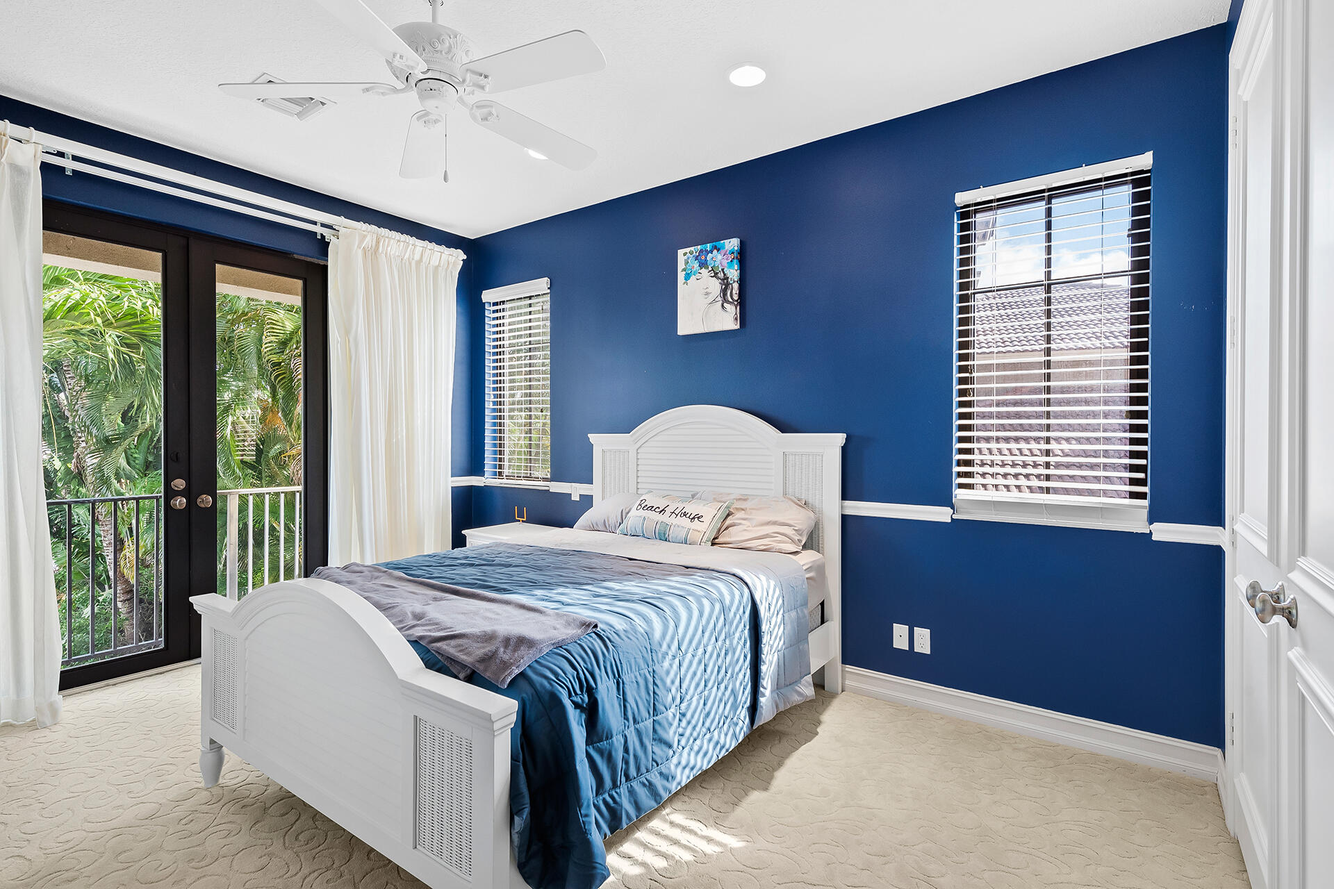 9455 Bridgebrook Drive Boca Raton, FL 33496 - Photo 39 of 63 a bedroom with a bed and a window