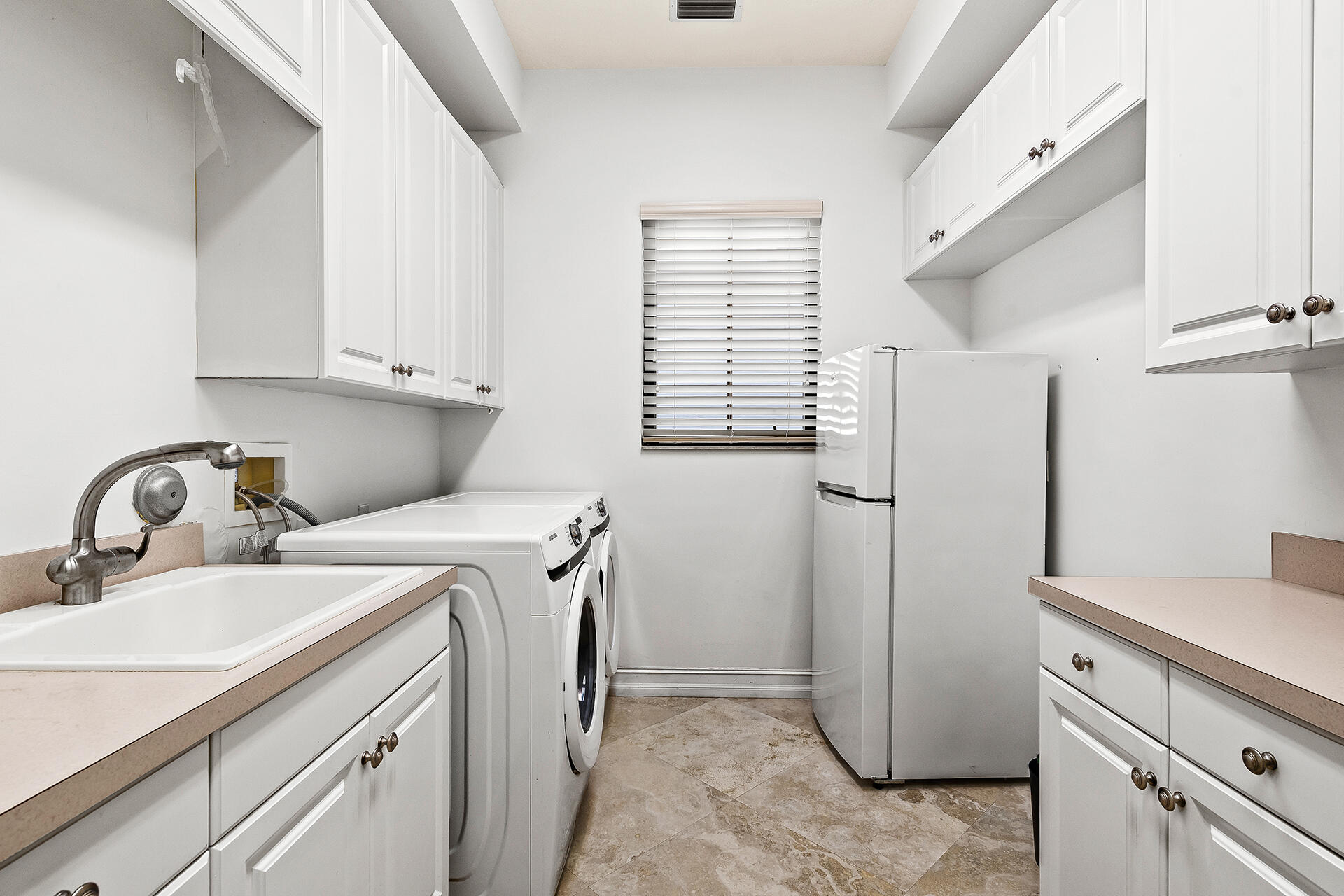 9455 Bridgebrook Drive Boca Raton, FL 33496 - Photo 46 of 63 a utility room with dryer and washer