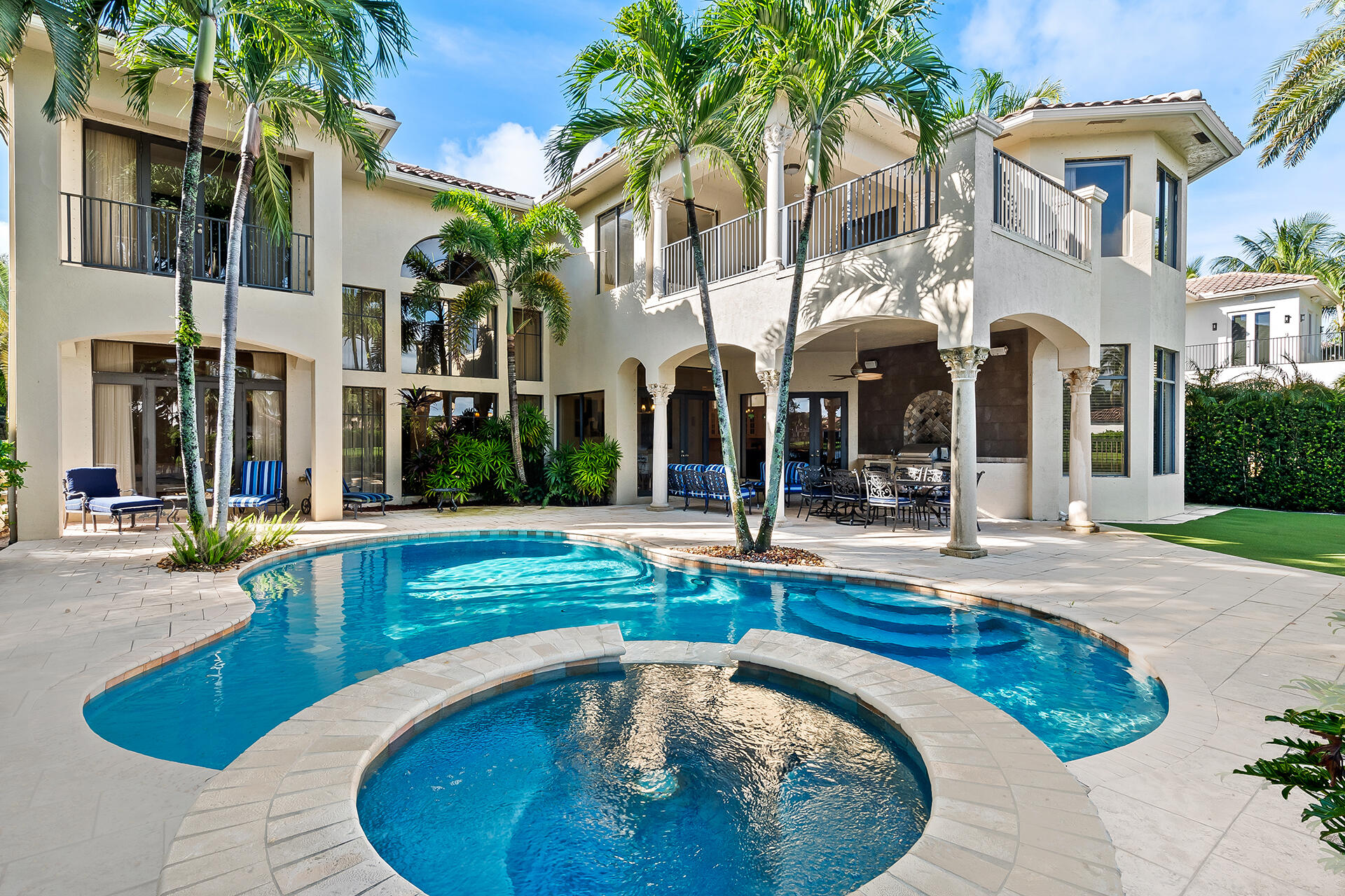 9455 Bridgebrook Drive Boca Raton, FL 33496 - Photo 5 of 63 a view of a house with swimming pool