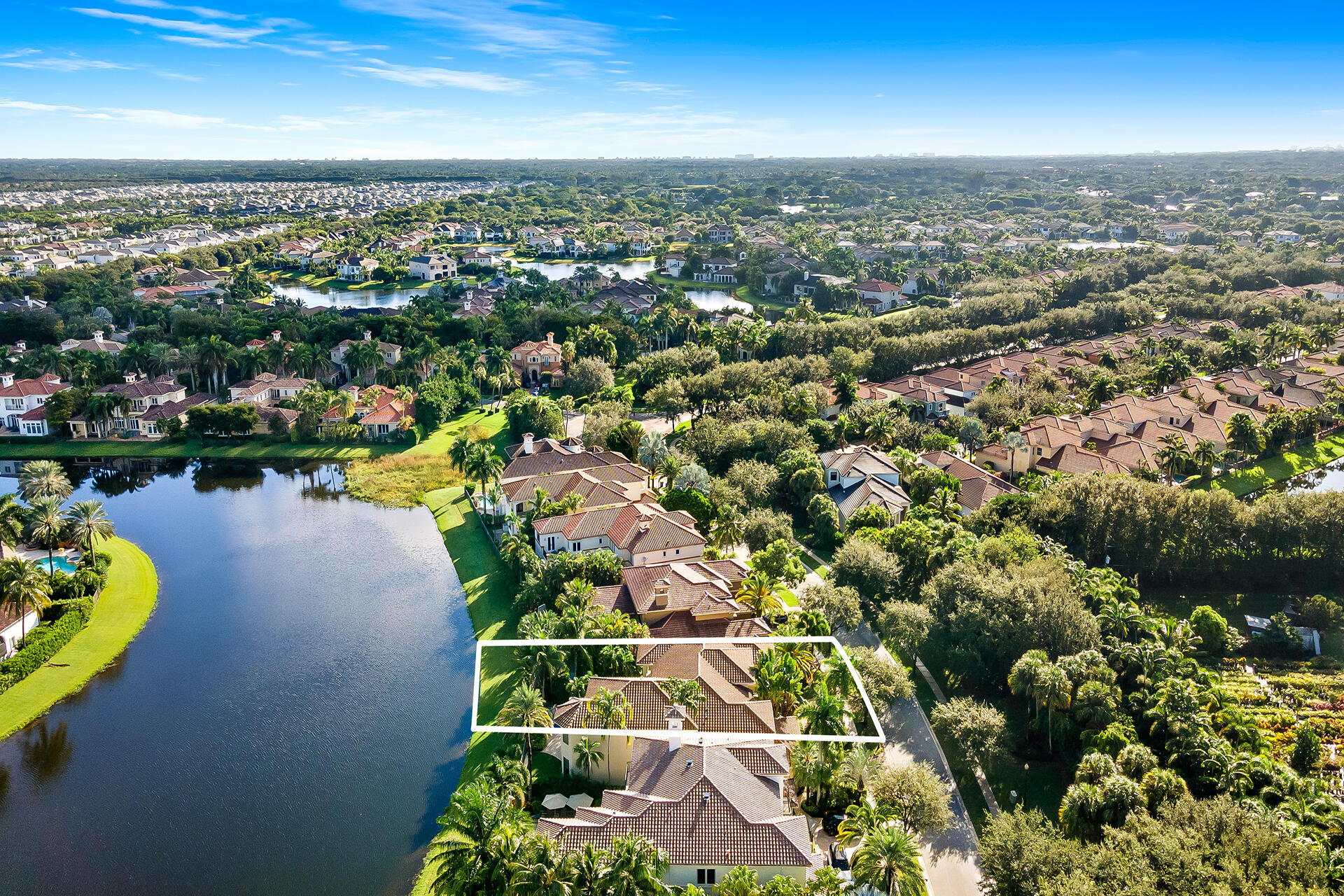9455 Bridgebrook Drive Boca Raton, FL 33496 - Photo 62 of 63 an aerial view of a city with lots of residential buildings