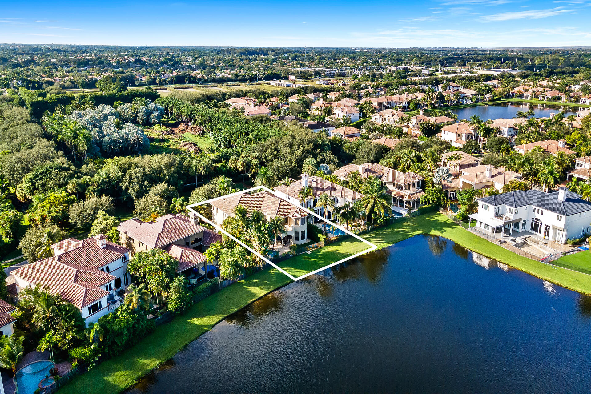 9455 Bridgebrook Drive Boca Raton, FL 33496 - Photo 63 of 63 an aerial view of a house with a garden