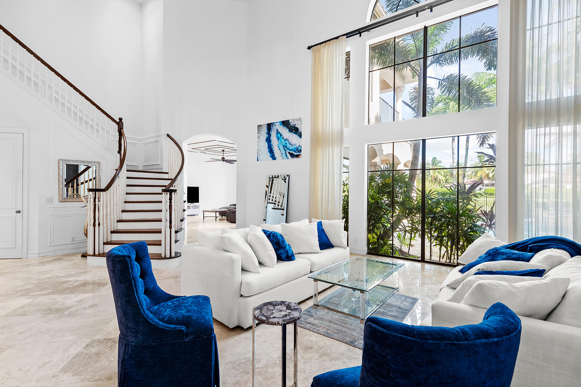 9455 Bridgebrook Drive Boca Raton, FL 33496 - Photo 8 of 63 a living room with furniture and a large window