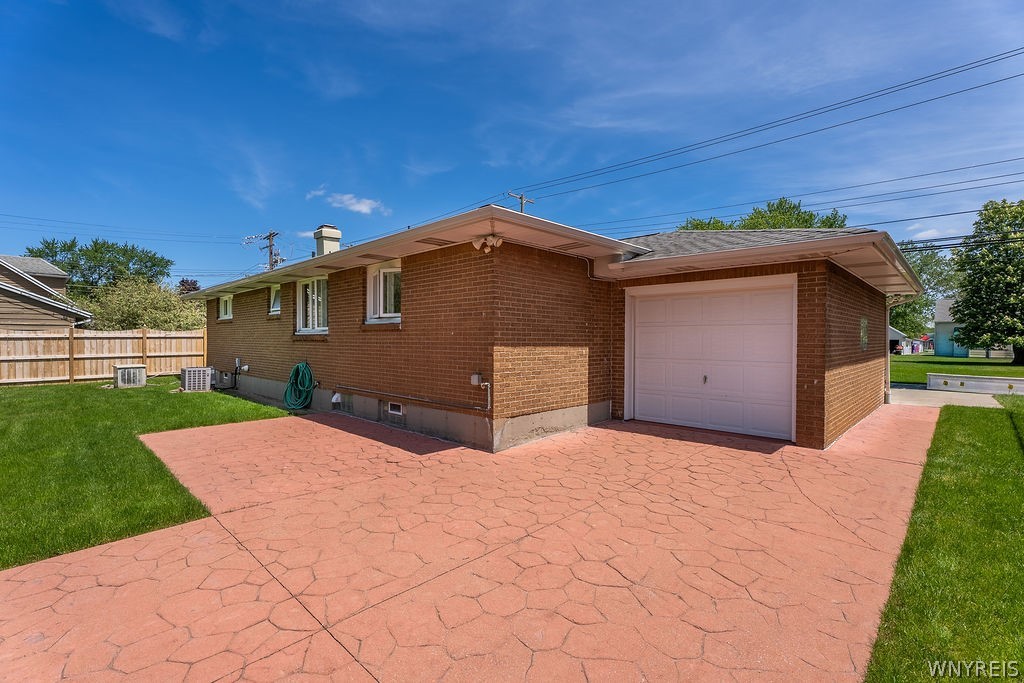 638 Borden Road Cheektowaga, NY 14227 - Photo 4 of 41 Huge colored concrete patio, front and rear garage