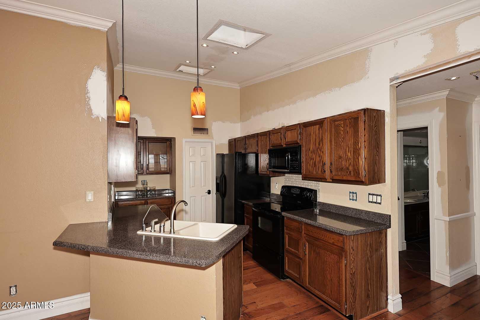 1971 East Buena Vista Drive Tempe, AZ 85284 - Photo 13 of 38 a kitchen with stainless steel appliances granite countertop a sink a stove and a refrigerator