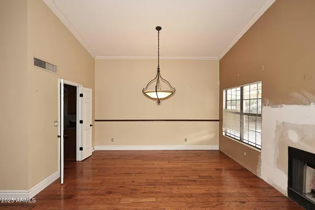 a spacious bathroom with a tub a double vanity sink and a mirror