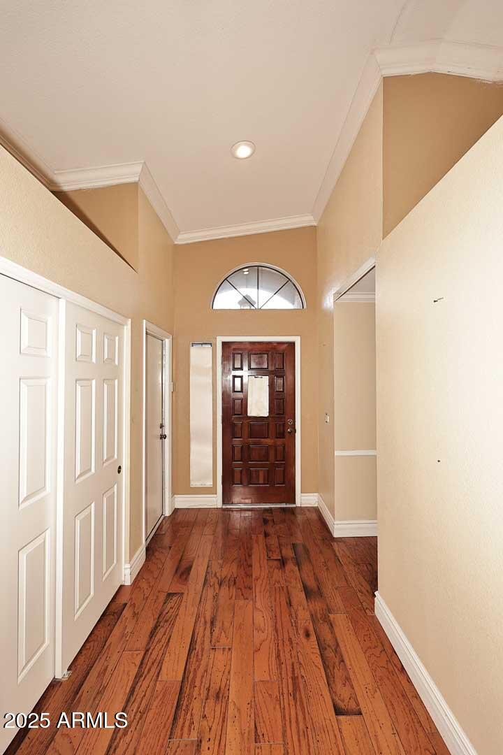 1971 East Buena Vista Drive Tempe, AZ 85284 - Photo 24 of 38 a view of an empty room with wooden floor and a window