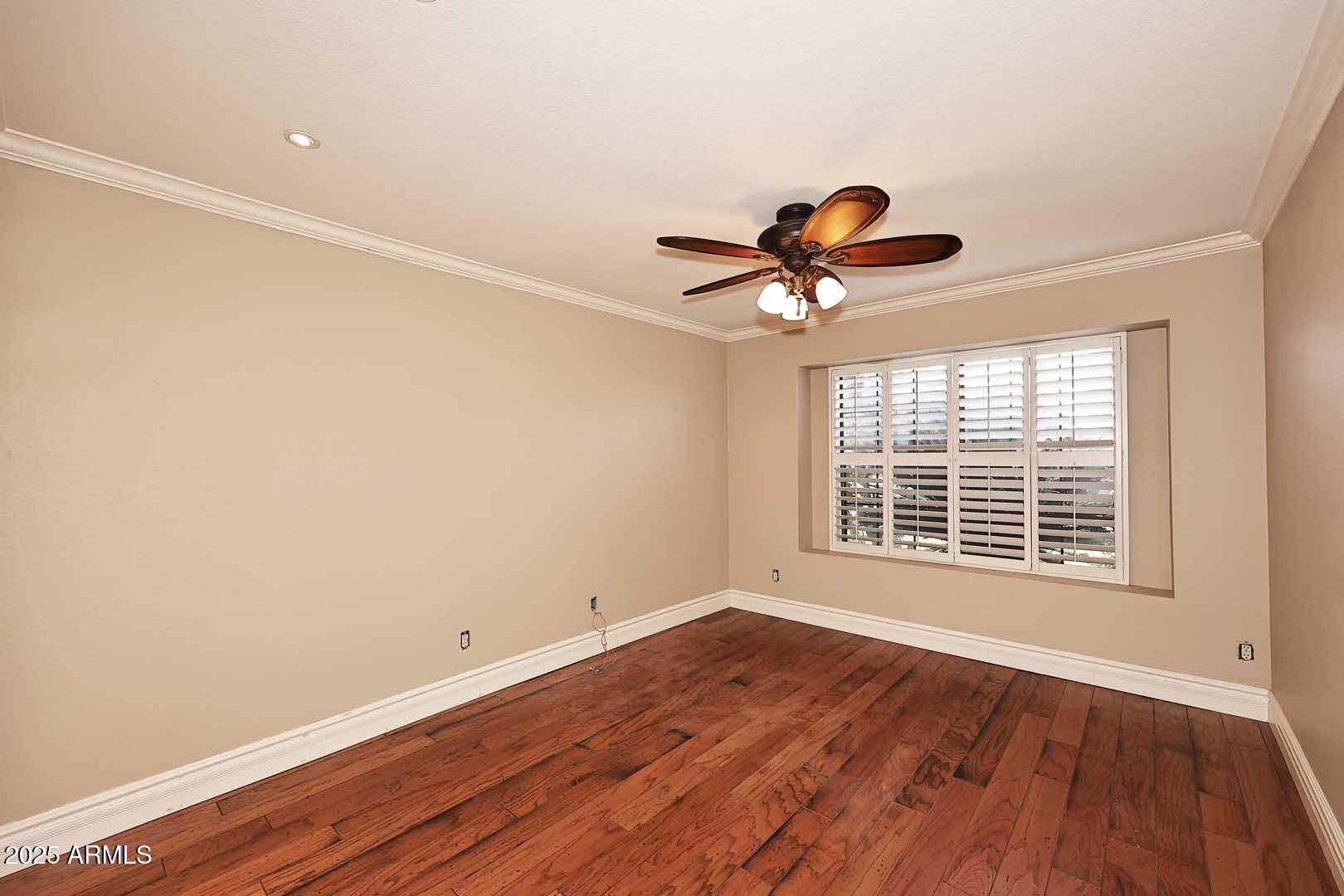 1971 East Buena Vista Drive Tempe, AZ 85284 - Photo 29 of 38 a view of a room with a wooden floor and a window