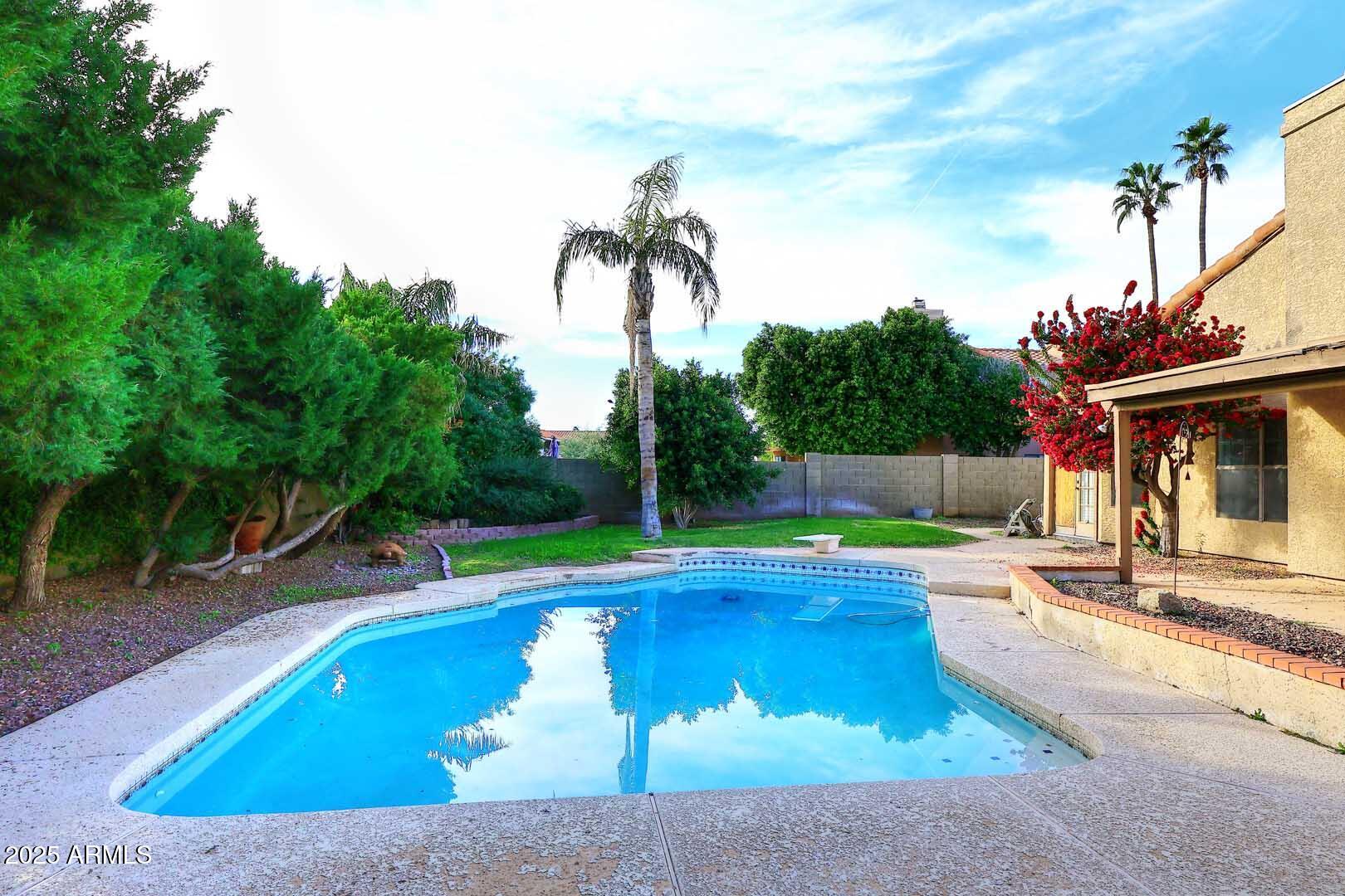 1971 East Buena Vista Drive Tempe, AZ 85284 - Photo 7 of 38 a view of a swimming pool with a patio