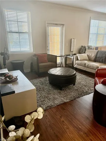a utility room with cabinets washer and dryer