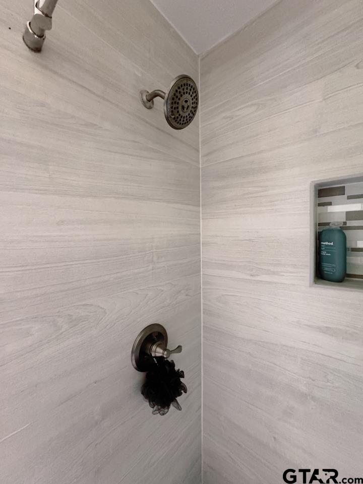 2411 Rodge Drive Tyler, TX 75701 - Photo 20 of 42 a bathroom with a shower