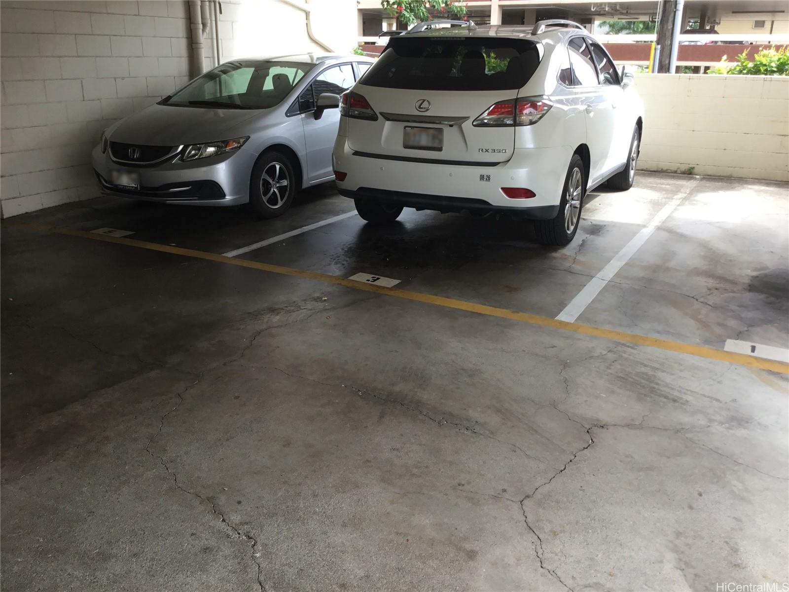 1440 Ward Avenue, Unit 301 Honolulu, HI 96822 - Photo 14 of 14 a car parked in garage
