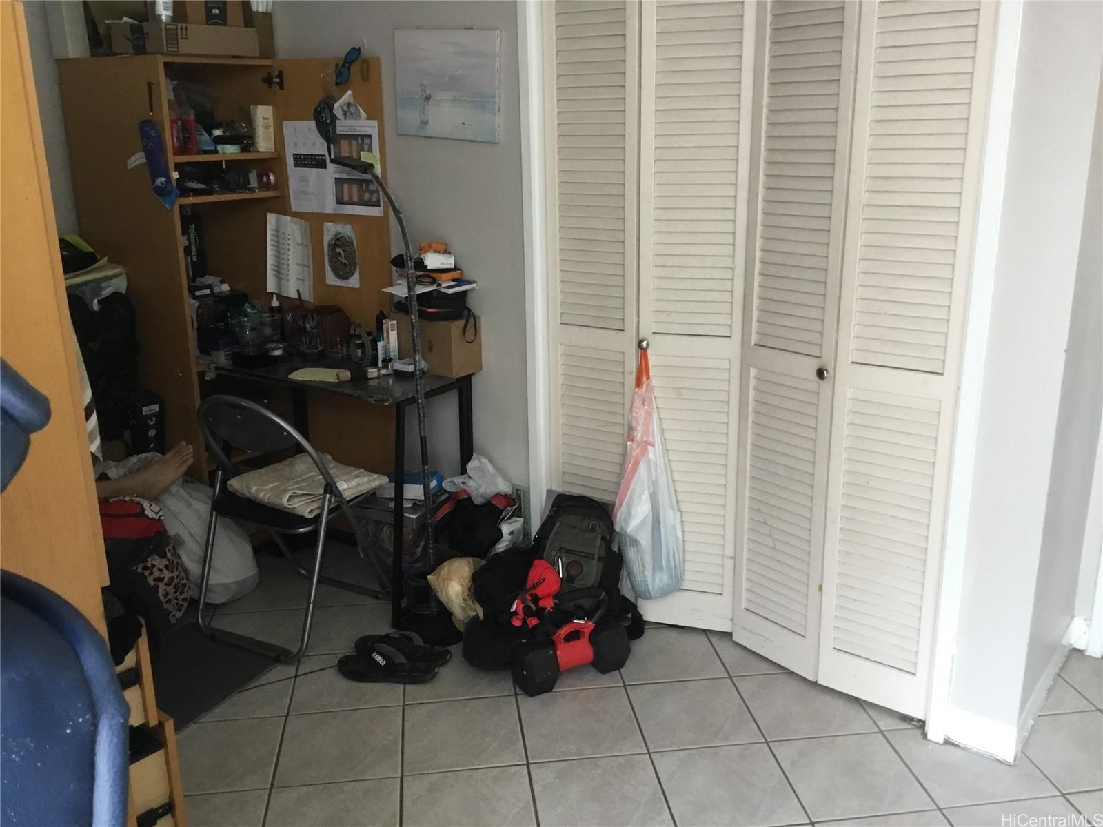 1440 Ward Avenue, Unit 301 Honolulu, HI 96822 - Photo 8 of 14 a view of a room with gym equipment