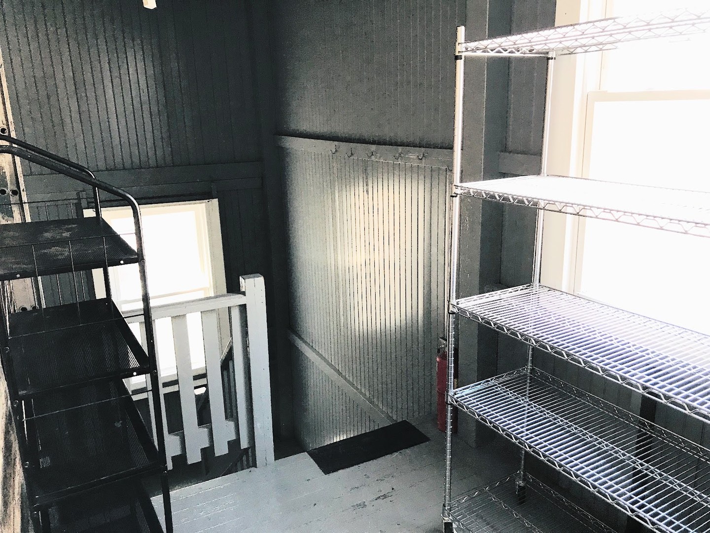 2328 North Kostner Avenue, Unit 2 Chicago, IL 60639 - Photo 8 of 10 a kitchen with kitchen island a counter and a refrigerator