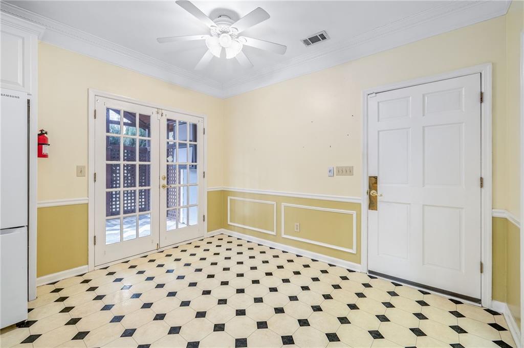 3374 Floral Court Suwanee, GA 30024 - Photo 13 of 54 a bedroom with a bed and a walk in closet