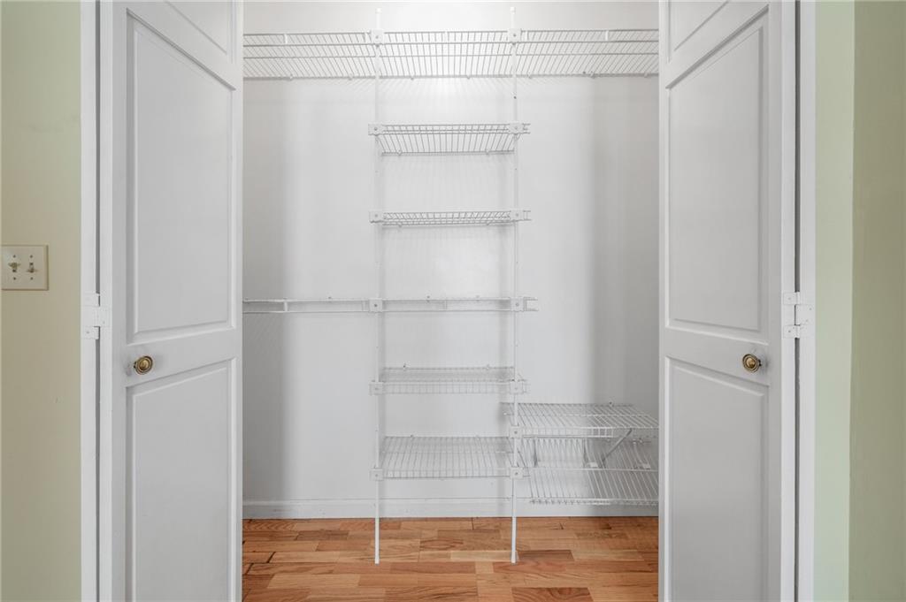 3374 Floral Court Suwanee, GA 30024 - Photo 24 of 54 a view of an empty walk in closet