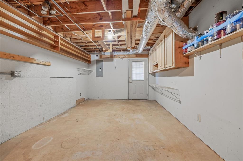 3374 Floral Court Suwanee, GA 30024 - Photo 39 of 54 a view of a room with racks on the wall