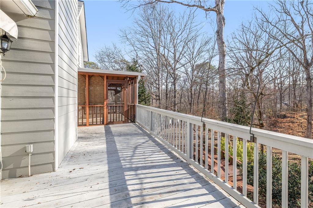 3374 Floral Court Suwanee, GA 30024 - Photo 41 of 54 a view of a house with a balcony