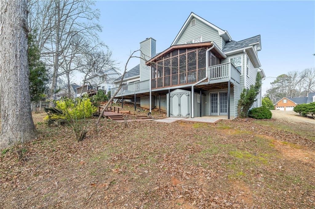 3374 Floral Court Suwanee, GA 30024 - Photo 47 of 54 a front view of a house with garden