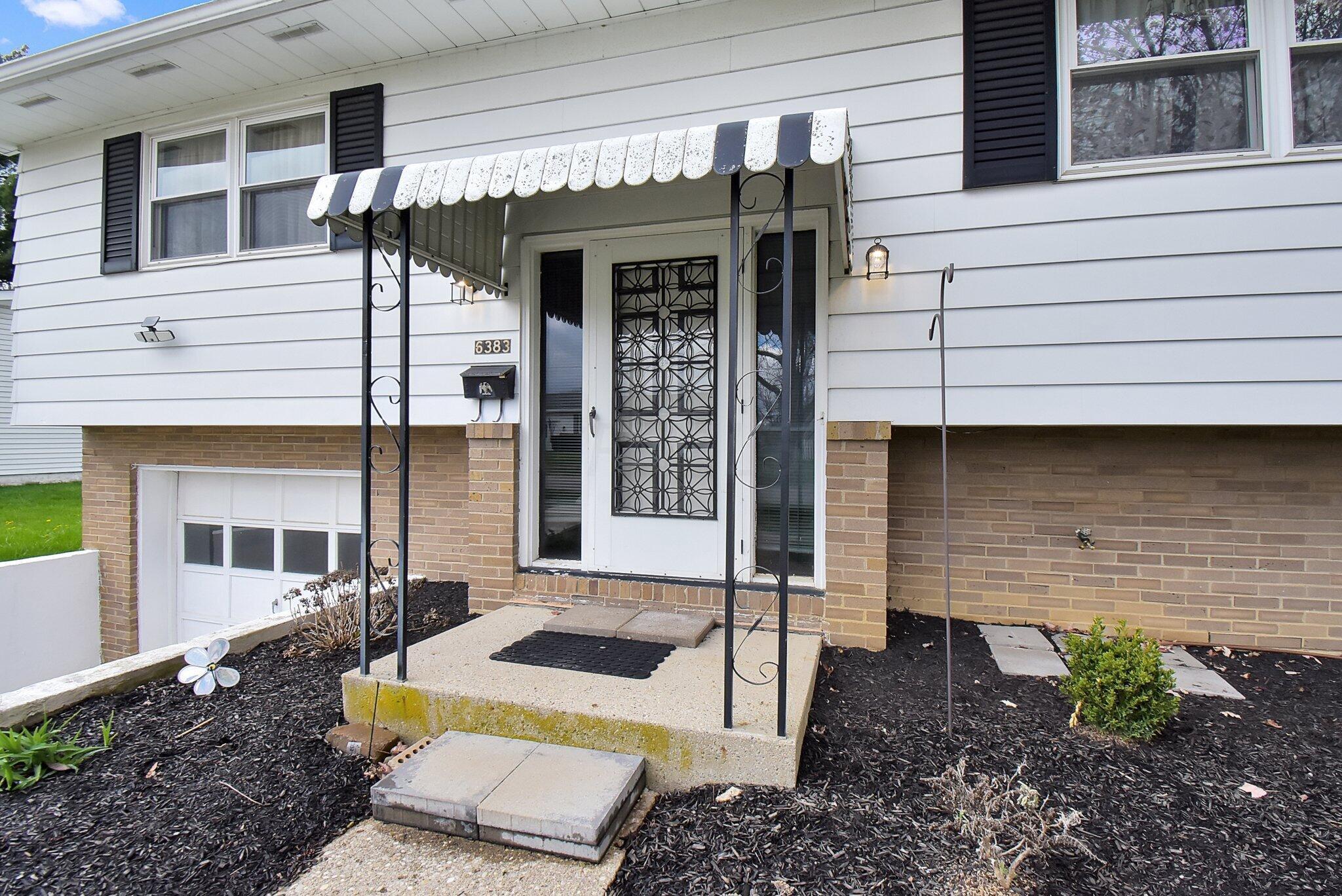 6383 Faircrest Road Columbus, OH 43229 - Photo 4 of 26 covered porch