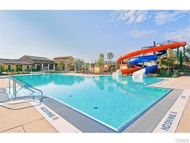 30240 Lamplighter Lane Menifee, CA 92584 - Photo 13 of 20 a view of a pool with a lake view