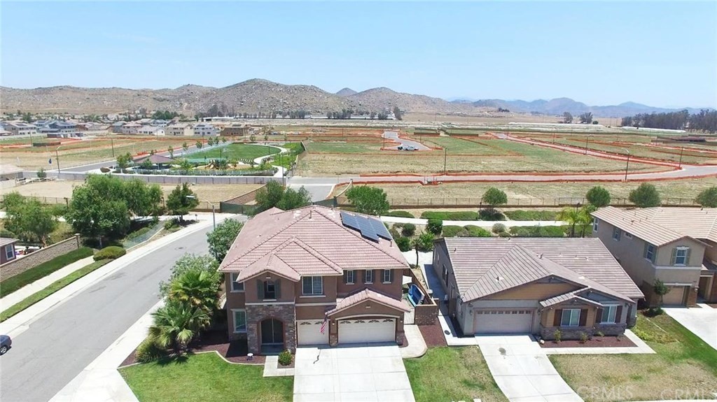 30240 Lamplighter Lane Menifee, CA 92584 - Photo 3 of 20 a view of a lake with a mountain in the background