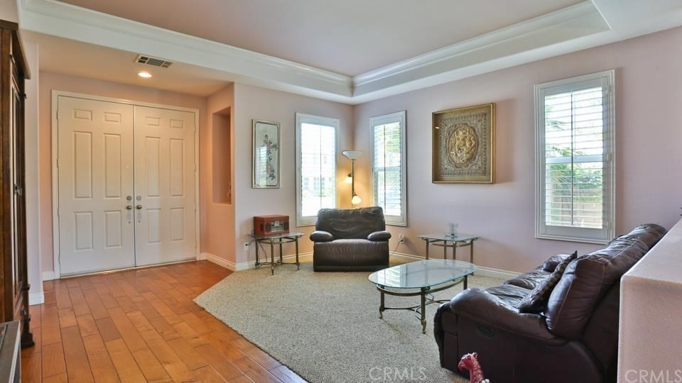 30240 Lamplighter Lane Menifee, CA 92584 - Photo 8 of 20 a living room with furniture and a window
