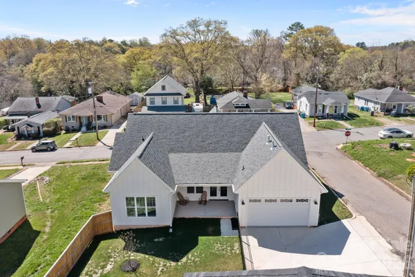 a aerial view of a house with a garden