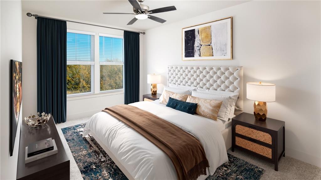 3100 Commerce Avenue Northwest, Unit C1 Duluth, GA 30096 - Photo 23 of 27 a bedroom with a bed and a window