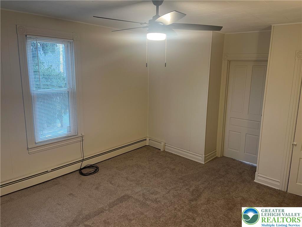 1053 Rising Sun Road Laurys Station, PA 18059 - Photo 11 of 16 an empty room with windows