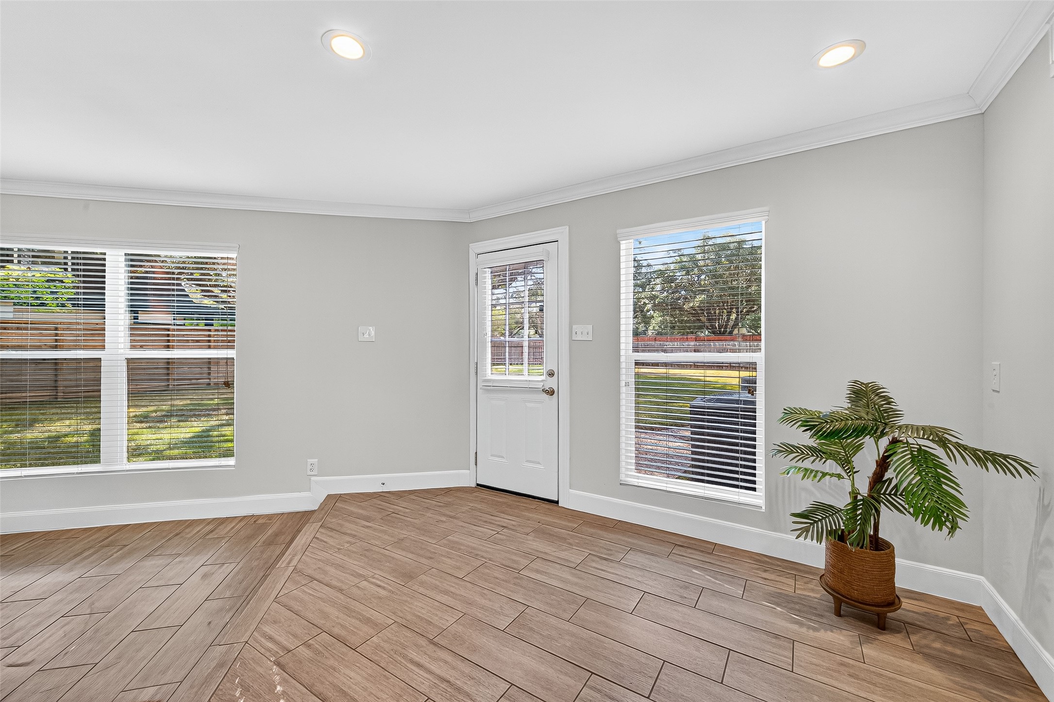 818 Silvergate Drive Houston, TX 77079 - Photo 36 of 40 a view of an entryway with wooden floor and a window